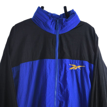 90s Reebok Blue/Black Shell Track Jacket (XL)